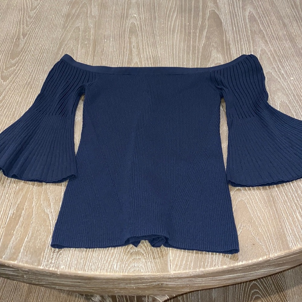 Never worn Intermix top with lace up back detail.